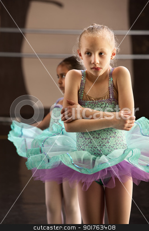 To use this stock image in your creative project, please select the size you need over to the right and click the "Add to Cart" button.
Your downloaded image will come with the Cutcaster watermark removed so don’t worry about the watermark you see on this page. Cold Ballet Student stock photo, Cute shivering mulatto child in ballet dress by Scott Griessel