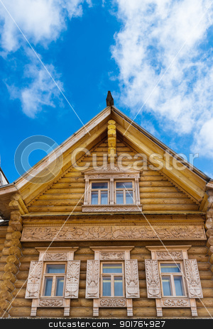 To use this stock image in your creative project, please select the size you need over to the right and click the "Add to Cart" button.
Your downloaded image will come with the Cutcaster watermark removed so don’t worry about the watermark you see on this page. Wooden decorated windows stock photo, Wooden decorated windows in log house under blue sky, Russian traditional architecture. by Iryna Rasko