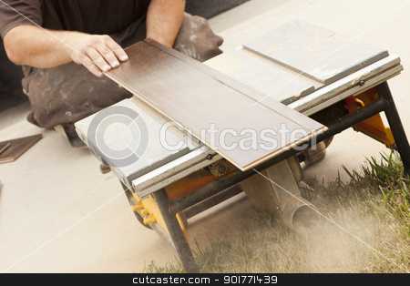 To use this stock image in your creative project, please select the size you need over to the right and click the "Add to Cart" button.
Your downloaded image will come with the Cutcaster watermark removed so don’t worry about the watermark you see on this page. Contractor Using Circular Saw Cutting of New Laminate Flooring stock photo, Contractor Using Circular Saw Cutting of New Laminate Flooring Renovation. by Andy Dean