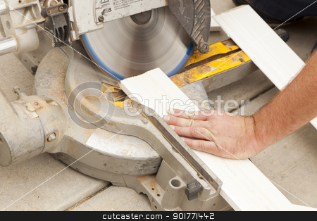 To use this stock image in your creative project, please select the size you need over to the right and click the "Add to Cart" button.
Your downloaded image will come with the Cutcaster watermark removed so don’t worry about the watermark you see on this page. Contractor Cutting New Baseboard for Renovation stock photo, Contractor Using Circular Saw Cutting New Baseboard for Renovation. by Andy Dean