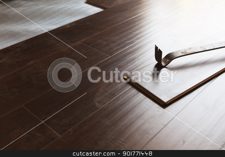 To use this stock image in your creative project, please select the size you need over to the right and click the "Add to Cart" button.
Your downloaded image will come with the Cutcaster watermark removed so don’t worry about the watermark you see on this page. Pry Bar Tool with New Laminate Flooring stock photo, Pry Bar Tool with New Laminate Flooring Abstract. by Andy Dean