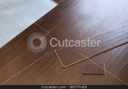To use this stock image in your creative project, please select the size you need over to the right and click the "Add to Cart" button.
Your downloaded image will come with the Cutcaster watermark removed so don’t worry about the watermark you see on this page. Newly Installed Brown Laminate Flooring stock photo, Newly Installed Brown Laminate Flooring Abstract. by Andy Dean