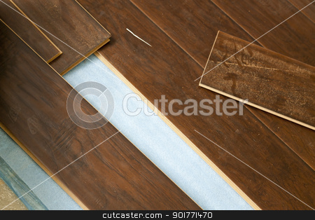 To use this stock image in your creative project, please select the size you need over to the right and click the "Add to Cart" button.
Your downloaded image will come with the Cutcaster watermark removed so don’t worry about the watermark you see on this page. Newly Installed Brown Laminate Flooring stock photo, Newly Installed Brown Laminate Flooring Abstract. by Andy Dean