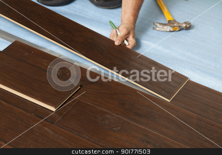To use this stock image in your creative project, please select the size you need over to the right and click the "Add to Cart" button.
Your downloaded image will come with the Cutcaster watermark removed so don’t worry about the watermark you see on this page. Man Installing New Laminate Wood Flooring stock photo, Man Installing New Laminate Wood Flooring Abstract. by Andy Dean