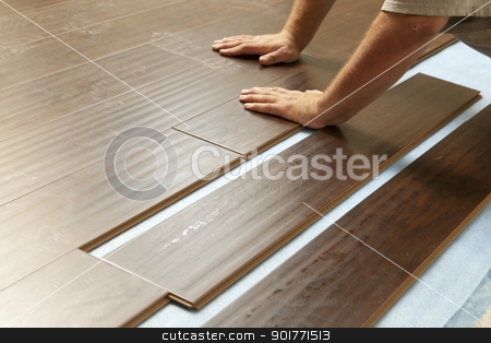 To use this stock image in your creative project, please select the size you need over to the right and click the "Add to Cart" button.
Your downloaded image will come with the Cutcaster watermark removed so don’t worry about the watermark you see on this page. Man Installing New Laminate Wood Flooring stock photo, Man Installing New Laminate Wood Flooring Abstract. by Andy Dean