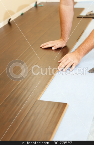 To use this stock image in your creative project, please select the size you need over to the right and click the "Add to Cart" button.
Your downloaded image will come with the Cutcaster watermark removed so don’t worry about the watermark you see on this page. Man Installing New Laminate Wood Flooring stock photo, Man Installing New Laminate Wood Flooring Abstract. by Andy Dean