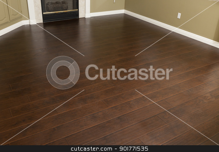 To use this stock image in your creative project, please select the size you need over to the right and click the "Add to Cart" button.
Your downloaded image will come with the Cutcaster watermark removed so don’t worry about the watermark you see on this page. Newly Installed Brown Laminate Flooring and Baseboards in Home stock photo, Beautiful Newly Installed Brown Laminate Flooring and Baseboards in Home. by Andy Dean