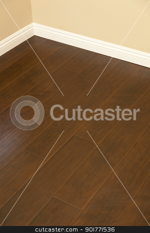 To use this stock image in your creative project, please select the size you need over to the right and click the "Add to Cart" button.
Your downloaded image will come with the Cutcaster watermark removed so don’t worry about the watermark you see on this page. Newly Installed Brown Laminate Flooring and Baseboards in Home stock photo, Beautiful Newly Installed Brown Laminate Flooring and Baseboards in Home. by Andy Dean