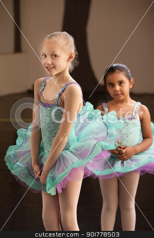 To use this stock image in your creative project, please select the size you need over to the right and click the "Add to Cart" button.
Your downloaded image will come with the Cutcaster watermark removed so don’t worry about the watermark you see on this page. Shy Ballet Students stock photo, Shy little girls in ballet dresses at a dance studio by Scott Griessel