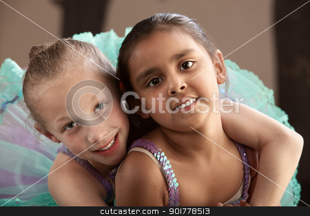 To use this stock image in your creative project, please select the size you need over to the right and click the "Add to Cart" button.
Your downloaded image will come with the Cutcaster watermark removed so don’t worry about the watermark you see on this page. Best Friends Hugging stock photo, Young ballet student gives her friend a hug by Scott Griessel