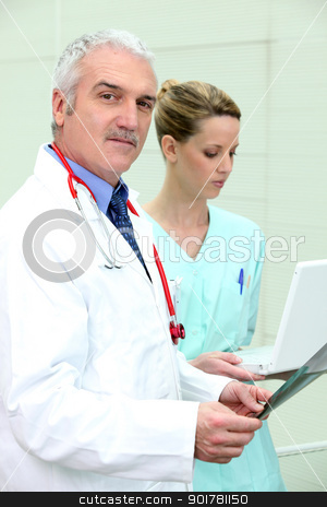 To use this stock image in your creative project, please select the size you need over to the right and click the "Add to Cart" button.
Your downloaded image will come with the Cutcaster watermark removed so don’t worry about the watermark you see on this page. Doctor stood with young female nurse stock photo, Doctor stood with young female nurse by photography33