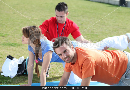 To use this stock image in your creative project, please select the size you need over to the right and click the "Add to Cart" button.
Your downloaded image will come with the Cutcaster watermark removed so don’t worry about the watermark you see on this page. Group doing push-ups in park stock photo, Group doing push-ups in park by photography33