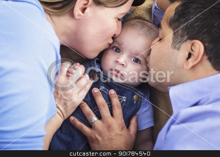 To use this stock image in your creative project, please select the size you need over to the right and click the "Add to Cart" button.
Your downloaded image will come with the Cutcaster watermark removed so don’t worry about the watermark you see on this page. Mixed Race Parent Kissing Their Son stock photo, Mixed Race Parent Kissing Their Son Together. by Andy Dean