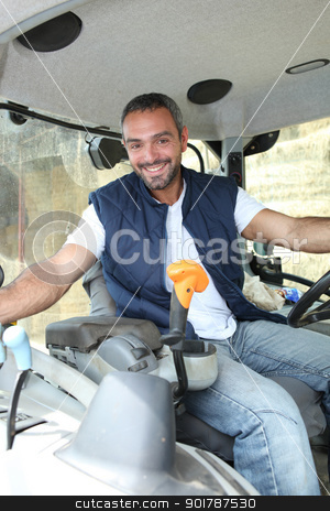 To use this stock image in your creative project, please select the size you need over to the right and click the "Add to Cart" button.
Your downloaded image will come with the Cutcaster watermark removed so don’t worry about the watermark you see on this page. Farmer in the cab of his tractor stock photo, Farmer in the cab of his tractor by photography33