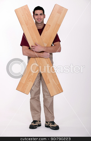 To use this stock image in your creative project, please select the size you need over to the right and click the "Add to Cart" button.
Your downloaded image will come with the Cutcaster watermark removed so don’t worry about the watermark you see on this page. Carpenter with floorboards stock photo, Carpenter with floorboards by photography33