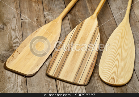 To use this stock image in your creative project, please select the size you need over to the right and click the "Add to Cart" button.
Your downloaded image will come with the Cutcaster watermark removed so don’t worry about the watermark you see on this page. wooden canoe paddles stock photo, blades of three wooden canoe paddles of different shape against grunge wood surface by Marek Uliasz