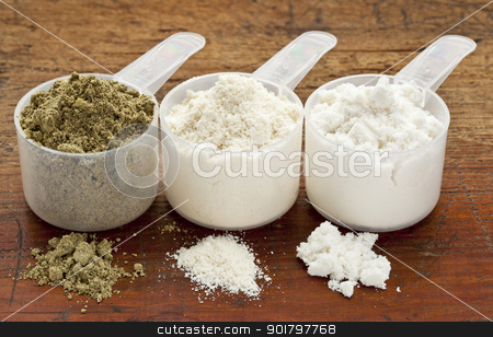 To use this stock image in your creative project, please select the size you need over to the right and click the "Add to Cart" button.
Your downloaded image will come with the Cutcaster watermark removed so don’t worry about the watermark you see on this page. hemp and whey protein powder stock photo, plastic measuring scoops of three protein powders (from left hemp seed, whey concentrate, whey isolate) on a grunge wood surface by Marek Uliasz