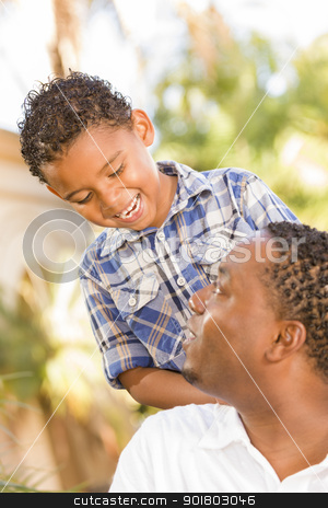 To use this stock image in your creative project, please select the size you need over to the right and click the "Add to Cart" button.
Your downloaded image will come with the Cutcaster watermark removed so don’t worry about the watermark you see on this page. Happy Mixed Race Father and Son Playing stock photo, Happy Mixed Race Father and Son Playing in the Park. by Andy Dean
