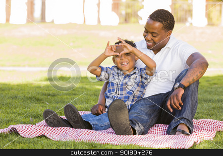 To use this stock image in your creative project, please select the size you need over to the right and click the "Add to Cart" button.
Your downloaded image will come with the Cutcaster watermark removed so don’t worry about the watermark you see on this page. Mixed Race Father and Son Making Heart Hand Sign stock photo, Happy African American Father and Mixed Race Son Making Heart Hand Sign at the Park. by Andy Dean