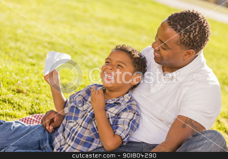 To use this stock image in your creative project, please select the size you need over to the right and click the "Add to Cart" button.
Your downloaded image will come with the Cutcaster watermark removed so don’t worry about the watermark you see on this page. Mixed Race Father and Son Playing with Paper Airplanes stock photo, Happy African American Father and Mixed Race Son Playing with Paper Airplanes in the Park.
by Andy Dean