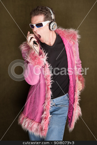 To use this stock image in your creative project, please select the size you need over to the right and click the "Add to Cart" button.
Your downloaded image will come with the Cutcaster watermark removed so don’t worry about the watermark you see on this page. Singing Out Loud stock photo, Man dancing in pink fluffy coat singing loudly by Scott Griessel