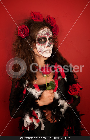 To use this stock image in your creative project, please select the size you need over to the right and click the "Add to Cart" button.
Your downloaded image will come with the Cutcaster watermark removed so don’t worry about the watermark you see on this page. Women With Roses for Dia De Los Muertos stock photo, A Pretty Middle Aged Lady With Roses and Wearing Makeup for All Souls Day by Scott Griessel