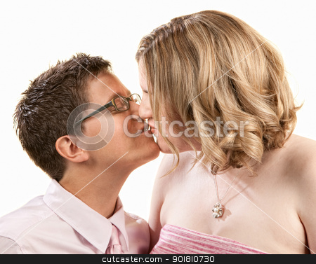 To use this stock image in your creative project, please select the size you need over to the right and click the "Add to Cart" button.
Your downloaded image will come with the Cutcaster watermark removed so don’t worry about the watermark you see on this page. Kissing Girlfriends stock photo, Kissing female couple close up over white by Scott Griessel
