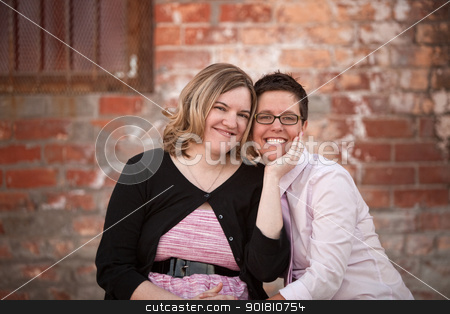 To use this stock image in your creative project, please select the size you need over to the right and click the "Add to Cart" button.
Your downloaded image will come with the Cutcaster watermark removed so don’t worry about the watermark you see on this page. Lesbian Couple Outdoors stock photo, Lesbian couple sitting next to each other outdoors by Scott Griessel