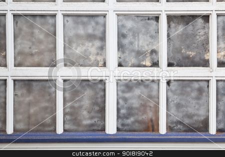 To use this stock image in your creative project, please select the size you need over to the right and click the "Add to Cart" button.
Your downloaded image will come with the Cutcaster watermark removed so don’t worry about the watermark you see on this page. old multi panel window stock photo, old grunge multi panel window with street reflection by Marek Uliasz