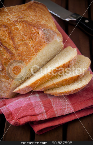 To use this stock image in your creative project, please select the size you need over to the right and click the "Add to Cart" button.
Your downloaded image will come with the Cutcaster watermark removed so don’t worry about the watermark you see on this page. Rustic bread cut into slices stock photo, Baked bread on the wood table with eggs, flour and rolling pin by Giordano Aita