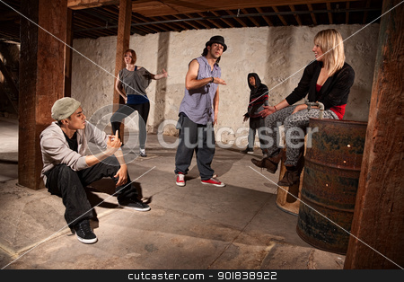To use this stock image in your creative project, please select the size you need over to the right and click the "Add to Cart" button.
Your downloaded image will come with the Cutcaster watermark removed so don’t worry about the watermark you see on this page. Group of Cool Hip Hop Dancers stock photo, Cool Hispanic male with group of five break dancers by Scott Griessel