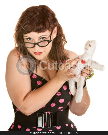 To use this stock image in your creative project, please select the size you need over to the right and click the "Add to Cart" button.
Your downloaded image will come with the Cutcaster watermark removed so don’t worry about the watermark you see on this page. Woman With Glasses and Voodoo Doll stock photo, Pretty woman in pink polka dot dress with voodoo doll by Scott Griessel