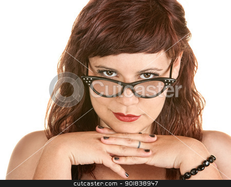 To use this stock image in your creative project, please select the size you need over to the right and click the "Add to Cart" button.
Your downloaded image will come with the Cutcaster watermark removed so don’t worry about the watermark you see on this page. Lady in Pink Polka Dot Dress stock photo, Woman in eyeglasses with folded hands under chin by Scott Griessel