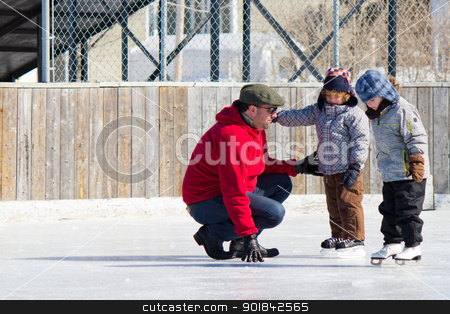 To use this stock image in your creative project, please select the size you need over to the right and click the "Add to Cart" button.
Your downloaded image will come with the Cutcaster watermark removed so don’t worry about the watermark you see on this page. Family having fun at the skating rink stock photo, Family having fun at the outdoor skating rink in winter. by Click Images
