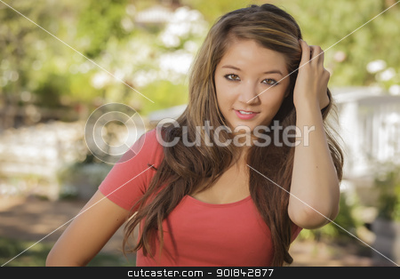 To use this stock image in your creative project, please select the size you need over to the right and click the "Add to Cart" button.
Your downloaded image will come with the Cutcaster watermark removed so don’t worry about the watermark you see on this page. Attractive Mixed Race Girl Portrait stock photo, Attractive Mixed Race Girl Portrait Outdoors. by Andy Dean
