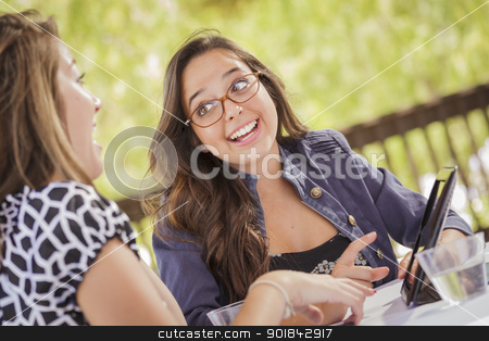 To use this stock image in your creative project, please select the size you need over to the right and click the "Add to Cart" button.
Your downloaded image will come with the Cutcaster watermark removed so don’t worry about the watermark you see on this page. Mixed Race Girls Working Together on Tablet Computer stock photo, Attractive Mixed Race Girls Smiling and Talking While Working on Tablet Computer Sitting Outdoors. by Andy Dean