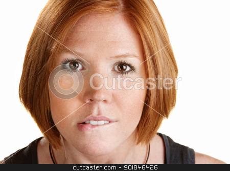 To use this stock image in your creative project, please select the size you need over to the right and click the "Add to Cart" button.
Your downloaded image will come with the Cutcaster watermark removed so don’t worry about the watermark you see on this page. Lady Staring Ahead stock photo, Young woman staring ahead and biting her lip by Scott Griessel