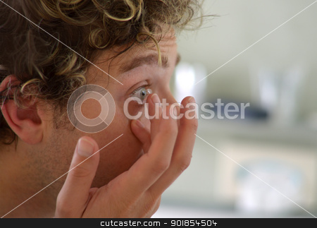 To use this stock image in your creative project, please select the size you need over to the right and click the "Add to Cart" button.
Your downloaded image will come with the Cutcaster watermark removed so don’t worry about the watermark you see on this page. Good looking young man applying contact lens stock photo, Handsome guy applying contact lens, side view by Stefano Cavoretto