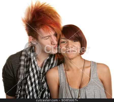 To use this stock image in your creative project, please select the size you need over to the right and click the "Add to Cart" button.
Your downloaded image will come with the Cutcaster watermark removed so don’t worry about the watermark you see on this page. Young Man Kissing Girlfriend stock photo, Young man with mohawk kisses mixed girlfriend over white by Scott Griessel