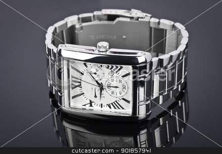 To use this stock image in your creative project, please select the size you need over to the right and click the "Add to Cart" button.
Your downloaded image will come with the Cutcaster watermark removed so don’t worry about the watermark you see on this page. Men's wrist watch on black background. Studio shoot. stock photo, by Paul Pirosca