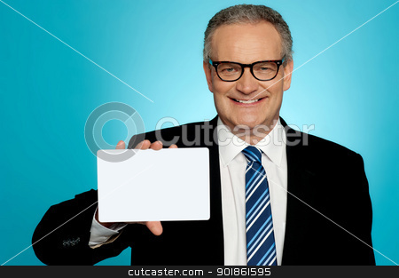To use this stock image in your creative project, please select the size you need over to the right and click the "Add to Cart" button.
Your downloaded image will come with the Cutcaster watermark removed so don’t worry about the watermark you see on this page. Businessman in glasses showing placard stock photo, Businessman wearing glasses showing blank white placard to camera by Ishay Botbol