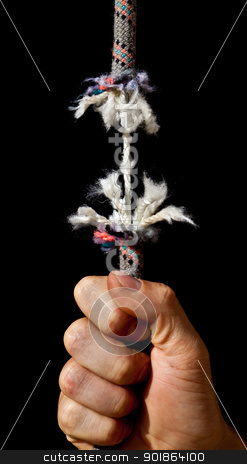 To use this stock image in your creative project, please select the size you need over to the right and click the "Add to Cart" button.
Your downloaded image will come with the Cutcaster watermark removed so don’t worry about the watermark you see on this page. Hand on breaking rope stock photo, A rope is breaking on a black background by Dario Rota