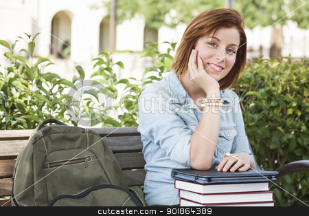 To use this stock image in your creative project, please select the size you need over to the right and click the "Add to Cart" button.
Your downloaded image will come with the Cutcaster watermark removed so don’t worry about the watermark you see on this page. Young Female Student Sitting On Campus with Backpack and Books stock photo, Smiling Young Pretty Female Student Sitting Outside on Bench with Backpack, Books and Touch Tablet. by Andy Dean