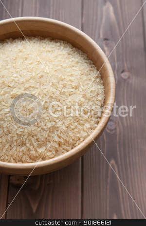 To use this stock image in your creative project, please select the size you need over to the right and click the "Add to Cart" button.
Your downloaded image will come with the Cutcaster watermark removed so don’t worry about the watermark you see on this page. Rice stock photo, Bowl of white rice on wood table by Giordano Aita