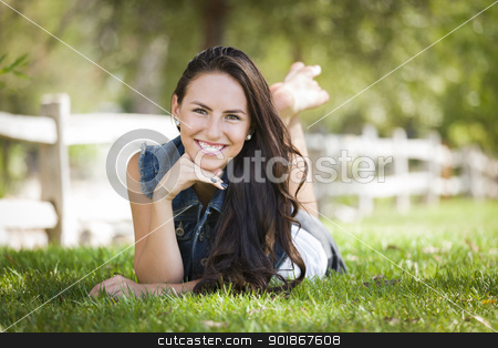 To use this stock image in your creative project, please select the size you need over to the right and click the "Add to Cart" button.
Your downloaded image will come with the Cutcaster watermark removed so don’t worry about the watermark you see on this page. Attractive Mixed Race Girl Portrait Laying in Grass stock photo, Attractive Mixed Race Girl Portrait Laying in Grass Outdoors. by Andy Dean
