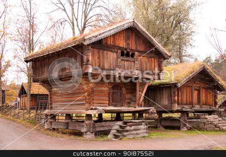 To use this stock image in your creative project, please select the size you need over to the right and click the "Add to Cart" button.
Your downloaded image will come with the Cutcaster watermark removed so don’t worry about the watermark you see on this page. Norwegian typical wooden house stock photo, Norwegian typical wooden house with grass roof by Nanisimova