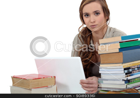 To use this stock image in your creative project, please select the size you need over to the right and click the "Add to Cart" button.
Your downloaded image will come with the Cutcaster watermark removed so don’t worry about the watermark you see on this page. female student with pile of books and laptop stock photo, female student with pile of books and laptop by photography33