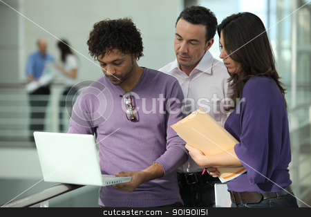 To use this stock image in your creative project, please select the size you need over to the right and click the "Add to Cart" button.
Your downloaded image will come with the Cutcaster watermark removed so don’t worry about the watermark you see on this page. Colleagues looking at a laptop stock photo, Colleagues looking at a laptop by photography33
