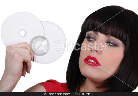 To use this stock image in your creative project, please select the size you need over to the right and click the "Add to Cart" button.
Your downloaded image will come with the Cutcaster watermark removed so don’t worry about the watermark you see on this page. Woman holding cds stock photo, Woman holding cds by photography33