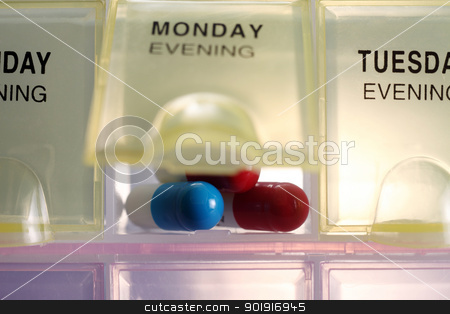 To use this stock image in your creative project, please select the size you need over to the right and click the "Add to Cart" button.
Your downloaded image will come with the Cutcaster watermark removed so don’t worry about the watermark you see on this page. pill box stock photo, clocse up of the daily pill box by eskaylim